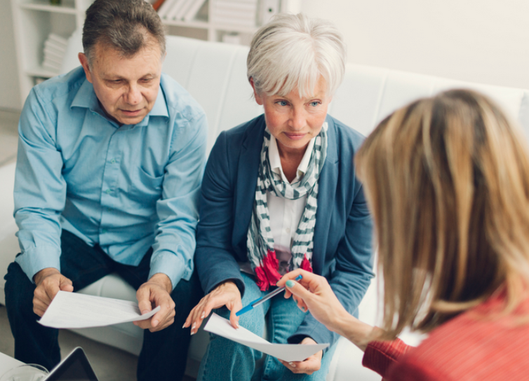 man and old woman discussion with lawyer